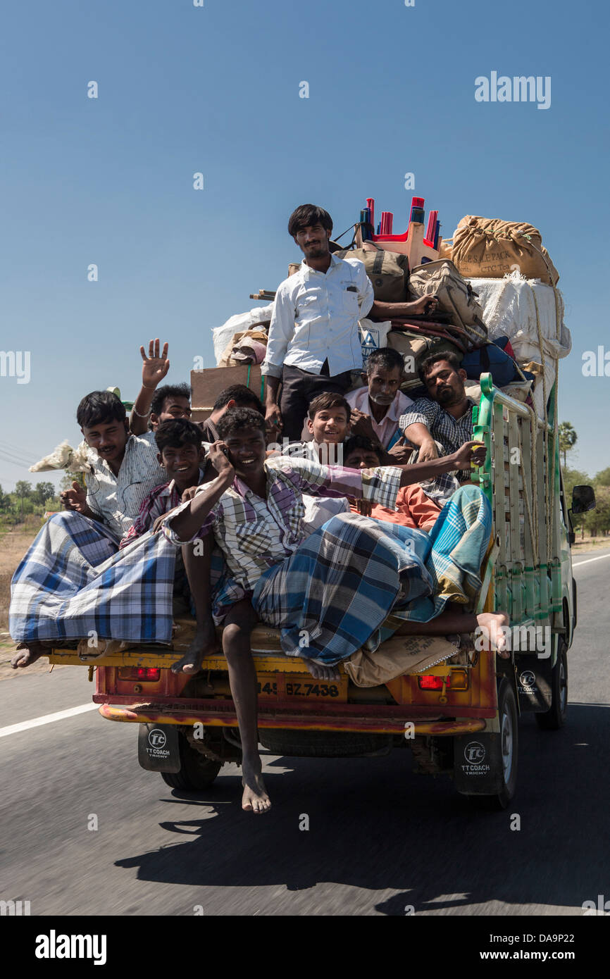 India, South India, Asia, Tamil Nadu, local  transport, dangerous, fun, happy, local, transport, truck, crowded, overloaded Stock Photo