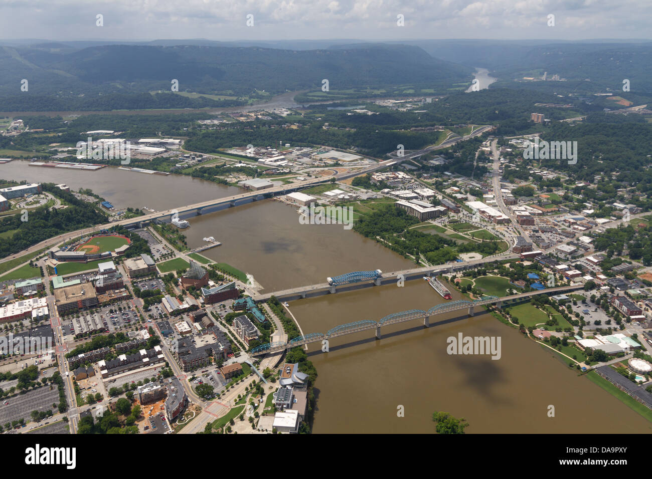 Aerial view of Chattanooga, Tennessee, looking northwest at the riverfront and bridges.  The Tennessee River is at flood stage. Stock Photo