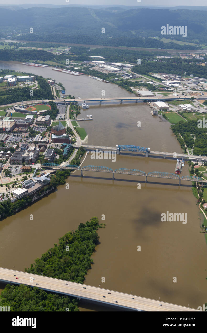 Aerial view of Chattanooga, Tennessee, looking west at the riverfront and bridges.  The Tennessee River is at flood stage. Stock Photo