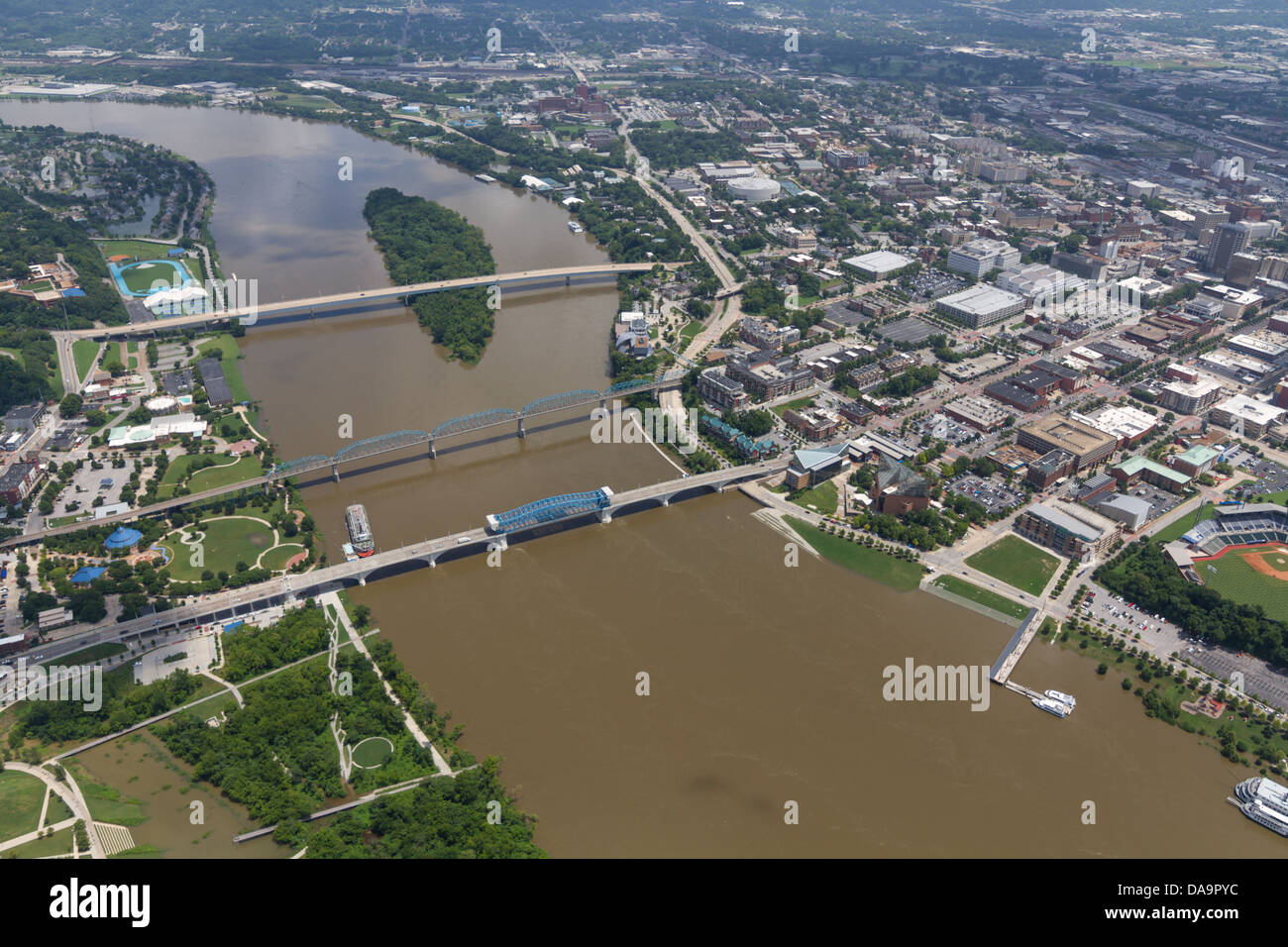 Aerial view of Chattanooga, Tennessee, looking southeast on a partly cloudy day.  The Tennessee River is at flood stage. Stock Photo