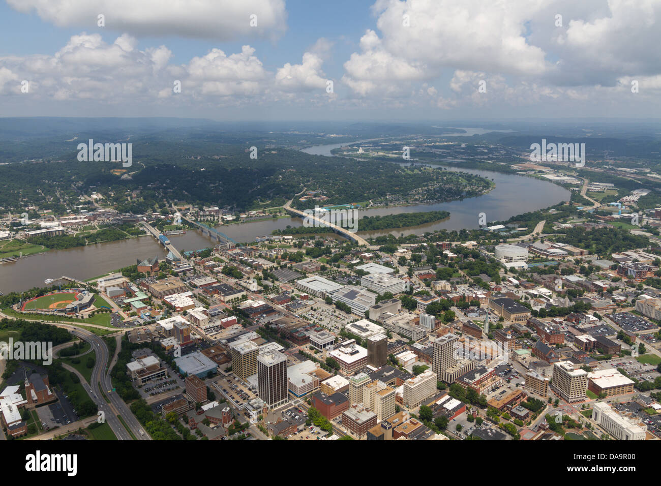 Aerial view of Chattanooga, Tennessee, looking northeast on a partly cloudy day.  The Tennessee River is at flood stage. Stock Photo
