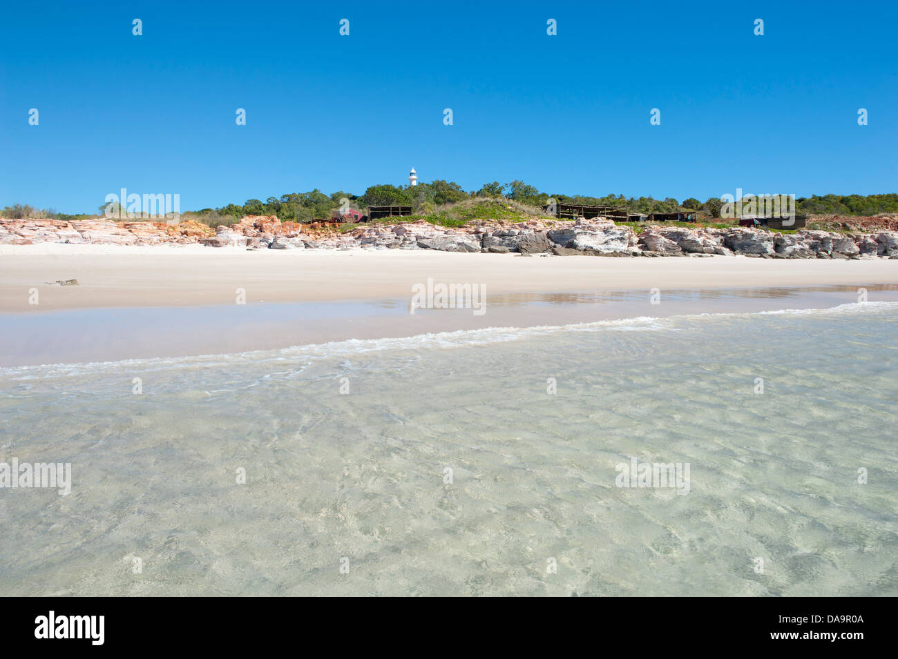 The lighthouse in view, the sandy eastern beach is the swimming beach at Cape Leveque, Dampier Peninsula, Kimberley, Australia Stock Photo
