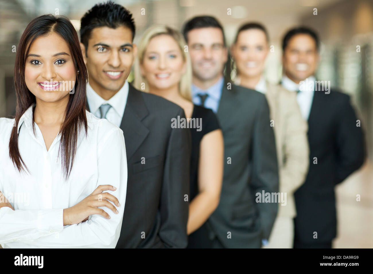 group of business team standing in a row Stock Photo - Alamy
