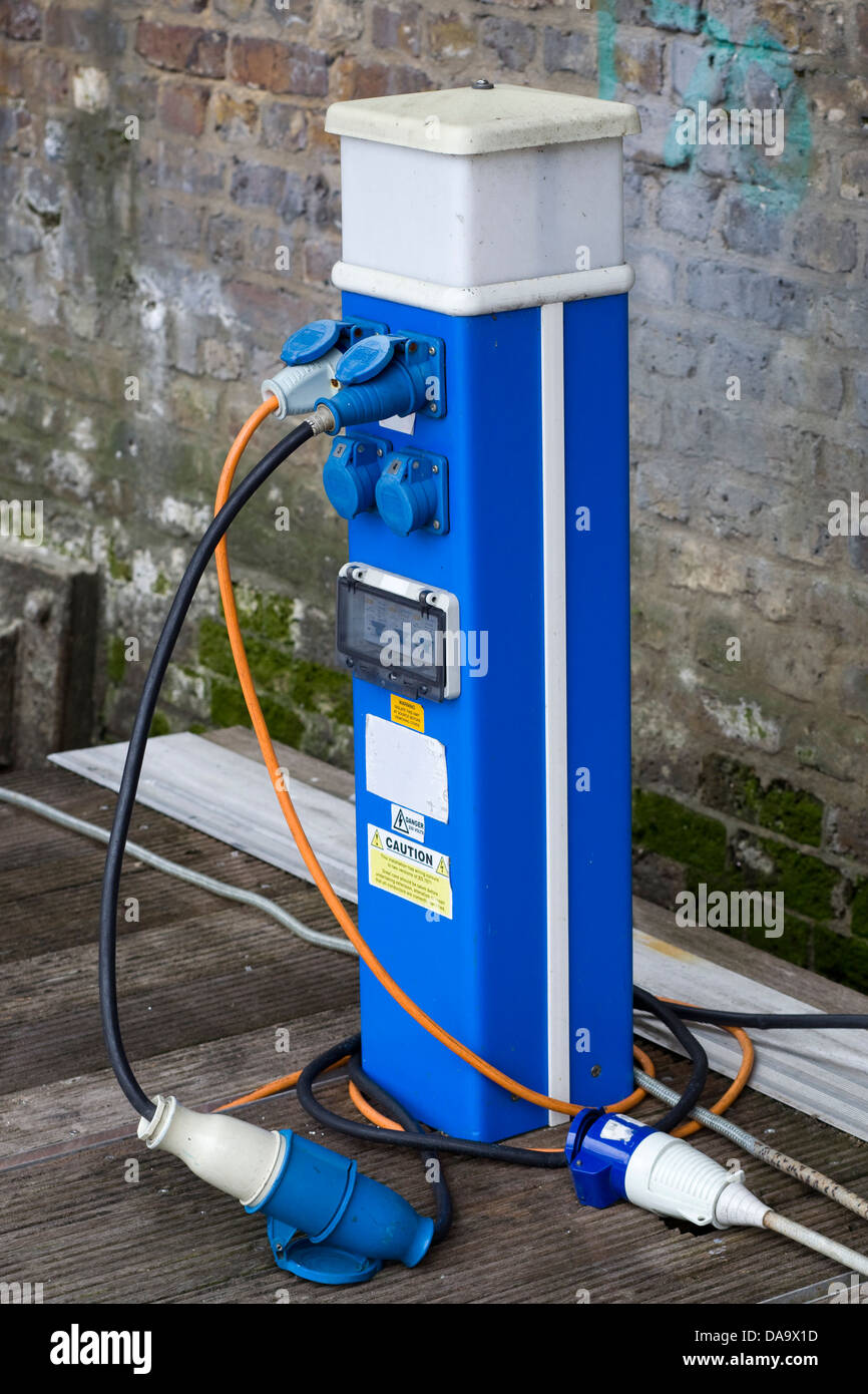 Electric charging Point for boats in a marina Stock Photo
