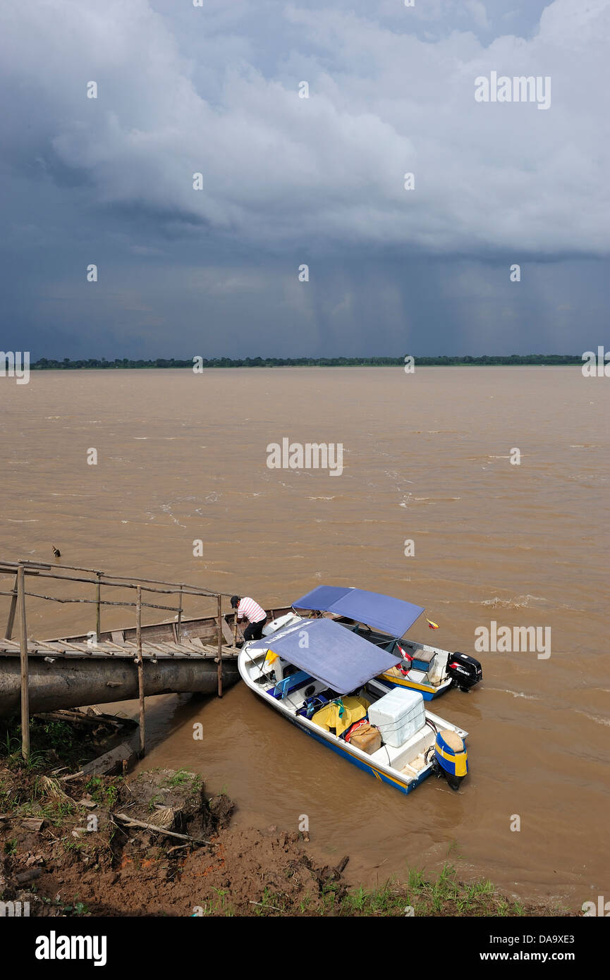 South America, Peru, Indigenous, Indian tribe, Indian Village, Ticuna Indians, Amazon, River, boat, storm, rain, Stock Photo