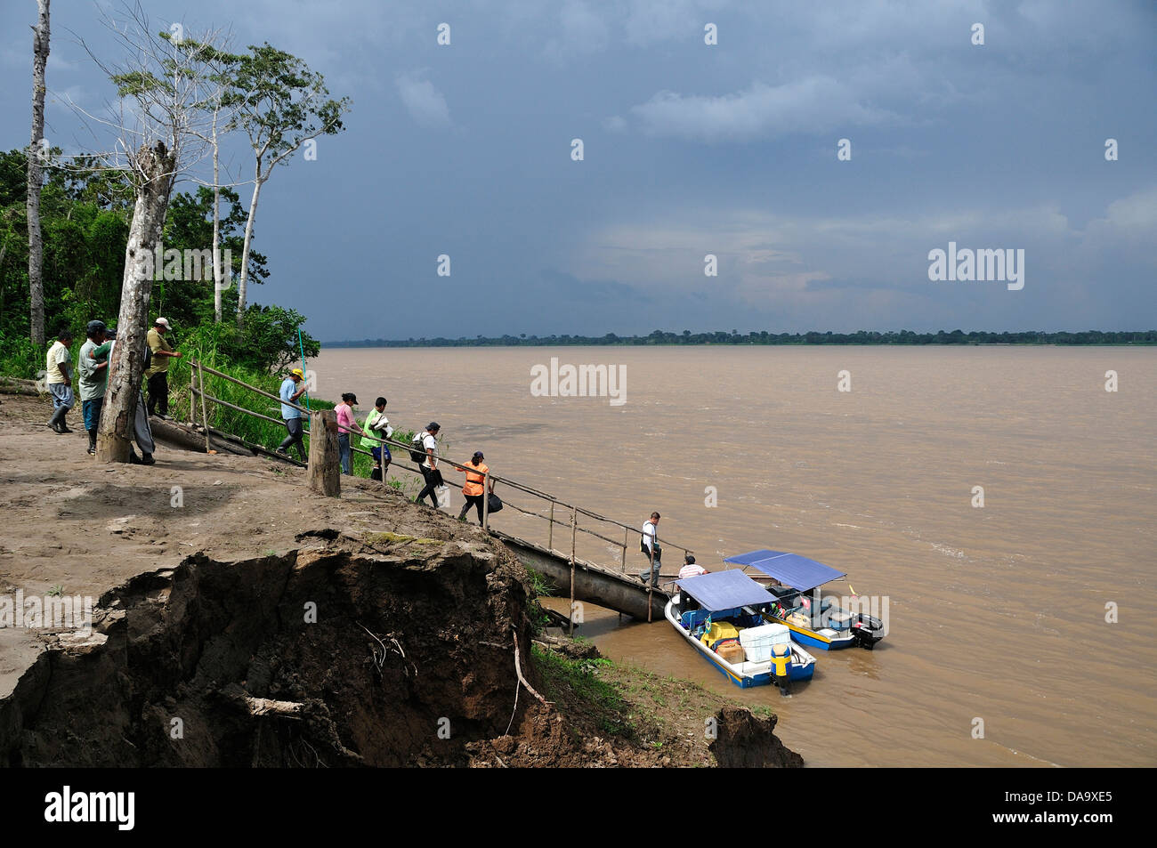 South America, Peru, Indigenous, Indian tribe, Indian Village, Ticuna Indians, Amazon, River, boat, storm, rain, Stock Photo