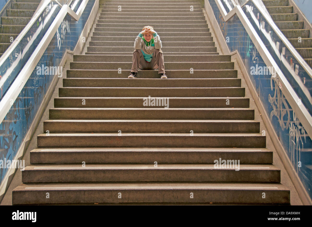 Germany, place Ebert, 11-year-old, Europe, boy, Cologne, laugh, model release, stair, Nordrhein Westphalia Stock Photo