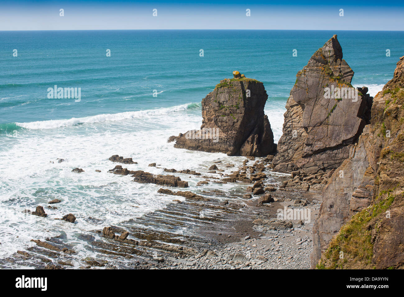 Evidence of coastal erosion seen from the cliff top of Sandymouth Bay, north Devon, England, on