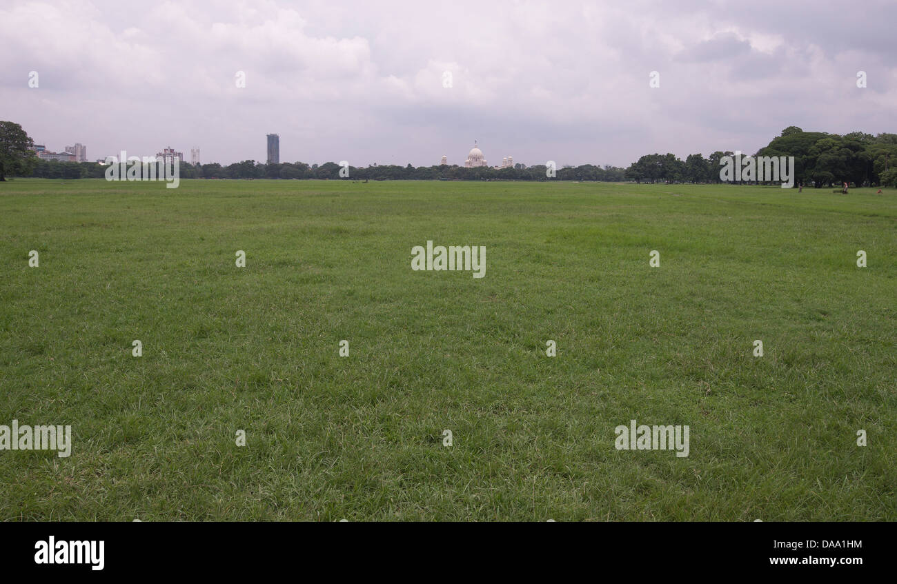 maidan kolkata with vast green field & victoria - Stock Photo