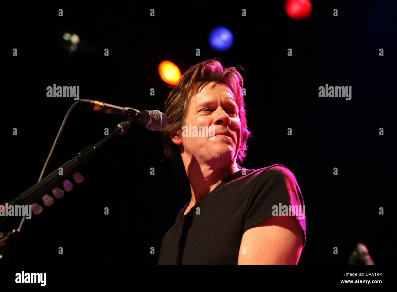 US actor Kevin Bacon performs on stage at the Centralstation music