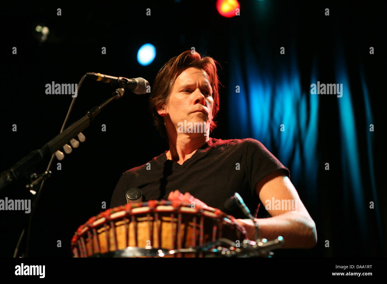 US actor Kevin Bacon performs on stage at the Centralstation music