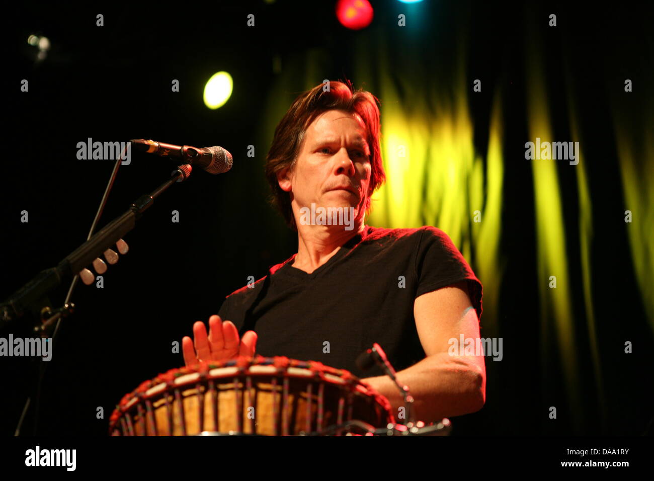 US actor Kevin Bacon performs on stage at the Centralstation music