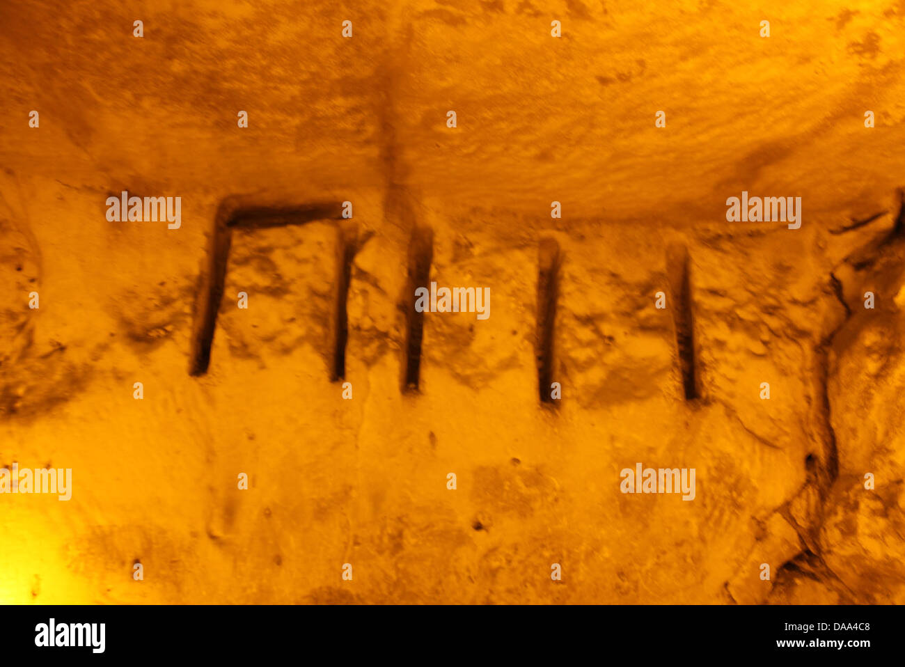 Unknown ancient script in cave of ancient Duluk or Doliche Gaziantep South East Turkey Stock Photo