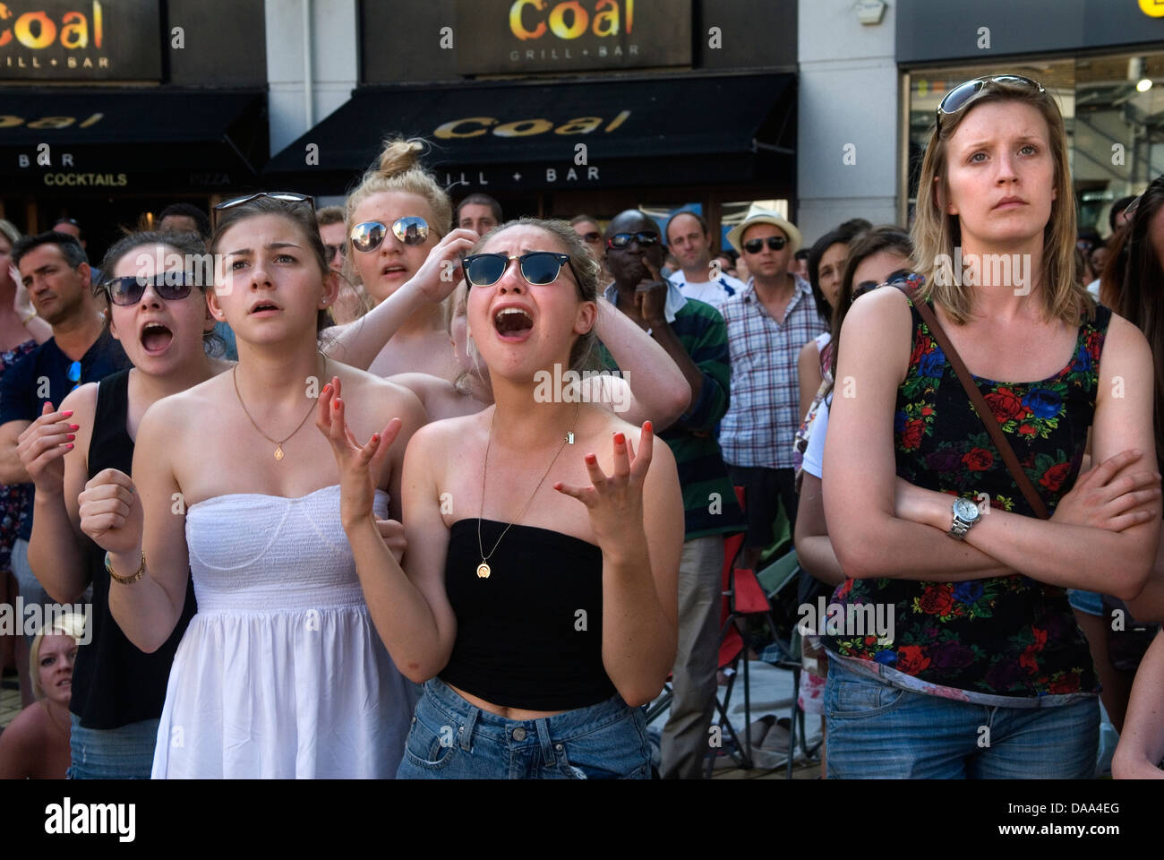 Emotions faces unhappy sports fans watching live TV outside of tennis disbelief at the way the game is going, HOMER SYKES Stock Photo