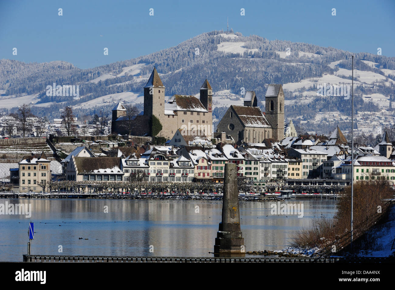 Rapperswil, castle, parish church, Bachtel, hill, lake of Zurich, winter, snow, Canton, St. Gall, Switzerland Stock Photo