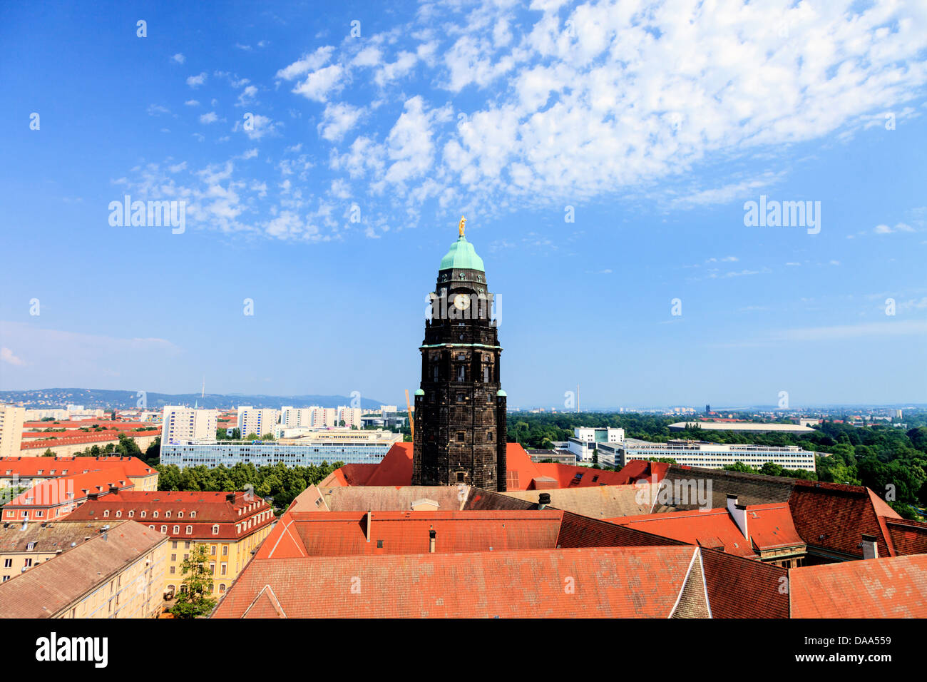bell tower over the tiled roofs Stock Photo