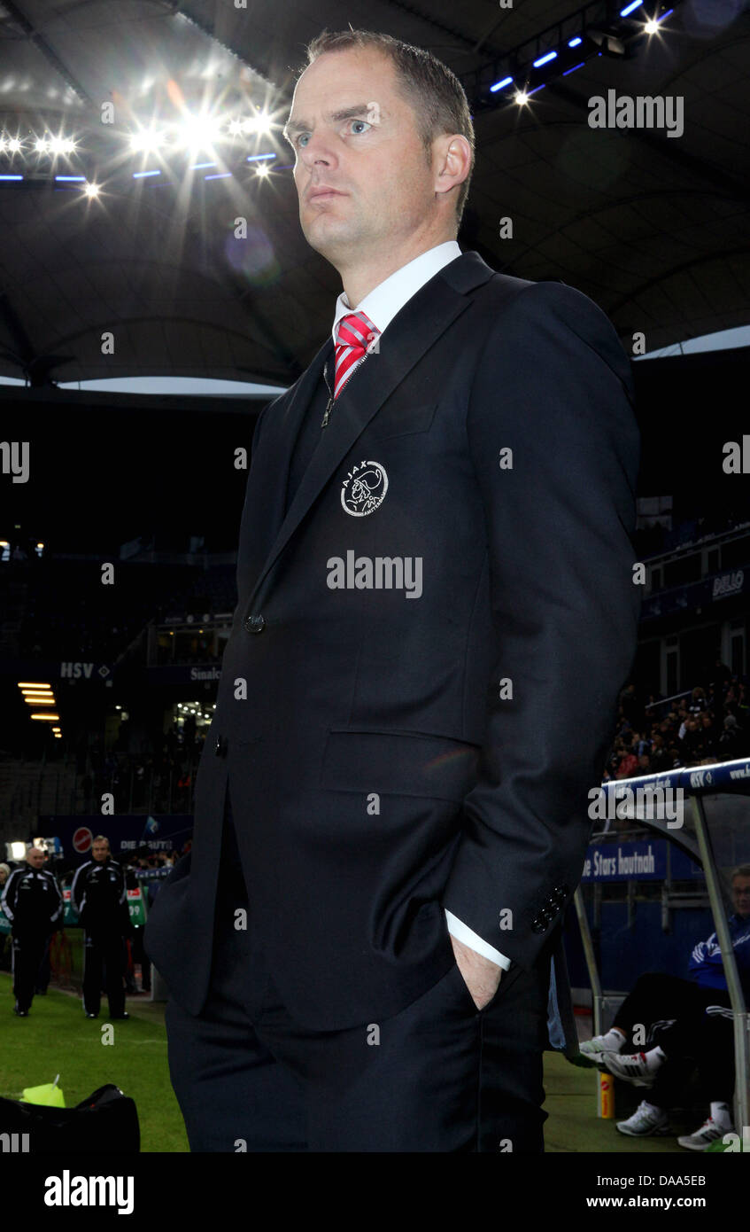 Amsterdam's coach Frank de Boer watches the team warm up during a test match of Hamburger SV versus Ajax Amsterdam in Hamburg, Germany, 8 January 2011. Photo: Malte Christians Stock Photo