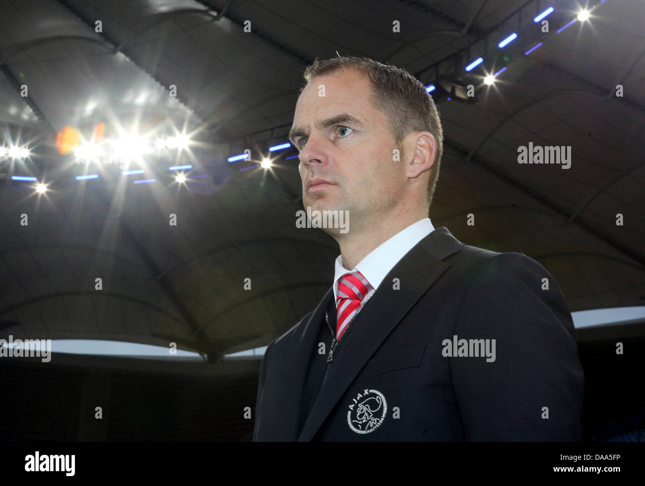 Amsterdam's coach Frank de Boer watches the team warm up during a test match of Hamburger SV versus Ajax Amsterdam in Hamburg, Germany, 8 January 2011. Photo: Malte Christians Stock Photo