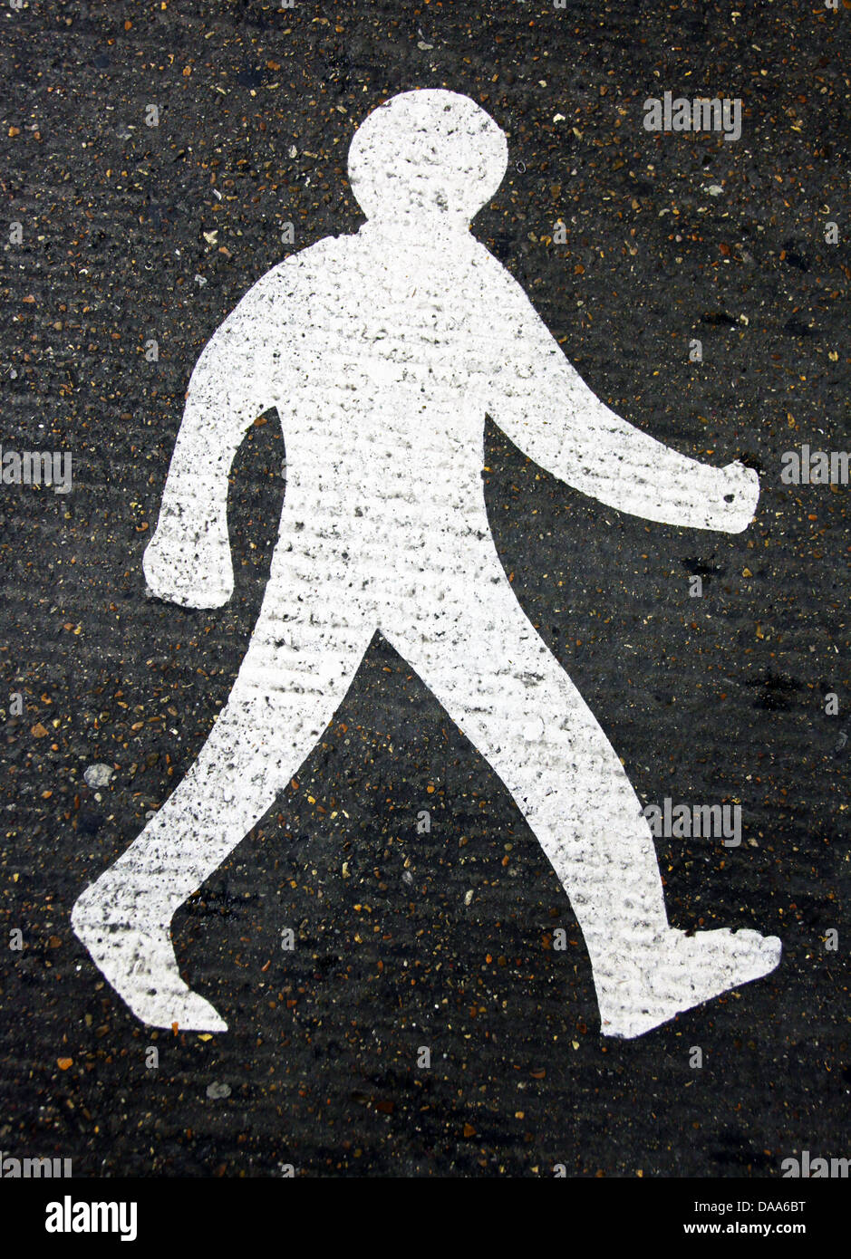 It's a photo of a human shape painted on the floor on the road to ...