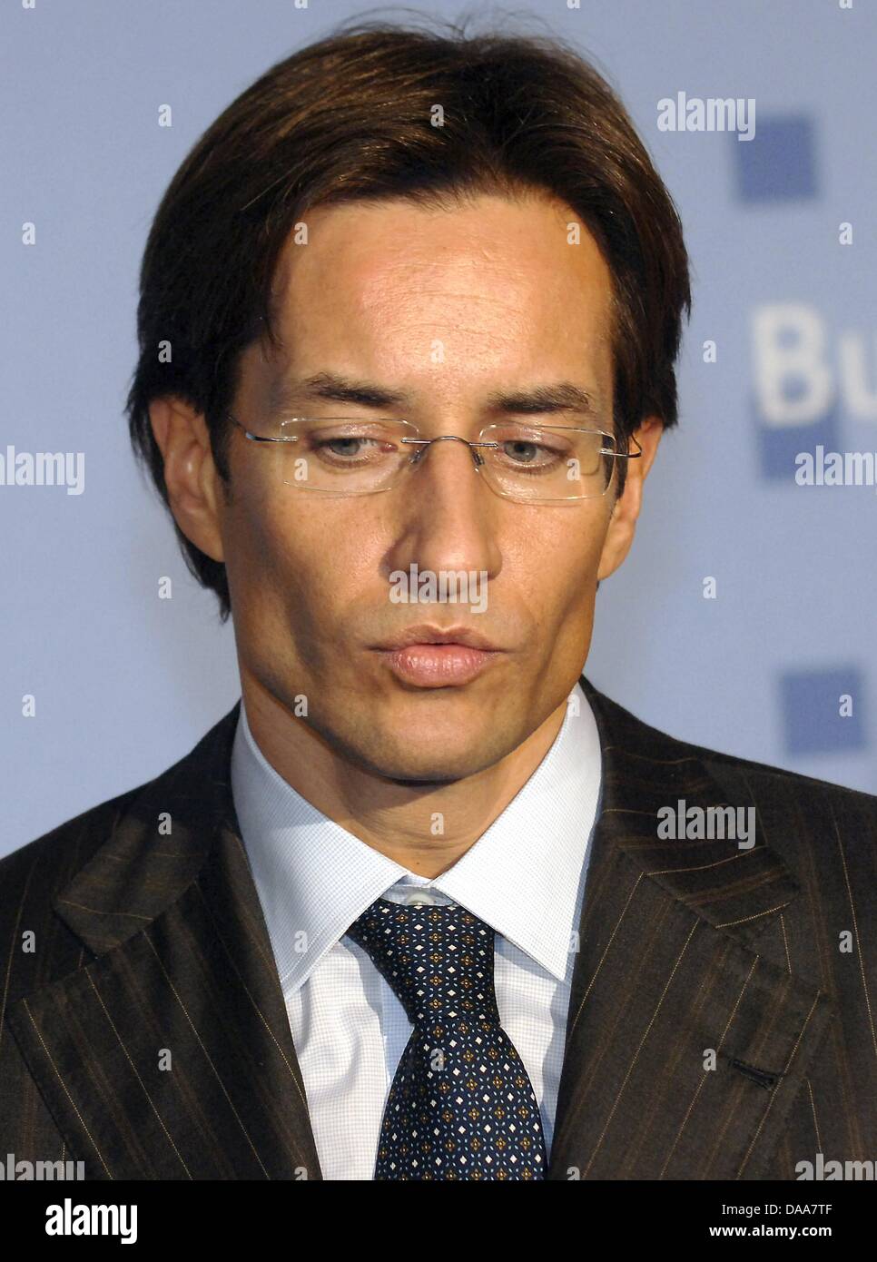 (dpa file) - A file picture dated 15 December 2005 shows Austrian finance minister Karl-Heinz Grasser pictured during a press conference in Berlin, Germany. Grasser has become a target for tax investors. While the public prosecution departments confirmed on 13 January 2011 that a criminal proceeding concerning tax matters was initiated, Grasser regards himself to be exposed to a ca Stock Photo