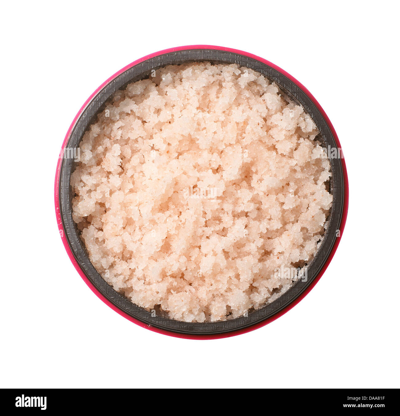 pink beige body scrub salts cut out onto a white background Stock Photo