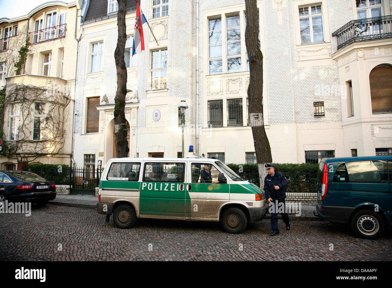 Police stand at the Embassy of Croatia in Berlin, Germany 17 January 2011. A hand granade was found at the entrance of the embassy. The police closed the area and removed a package with a hand granade. Photo: Wolfram Steinberg Stock Photo