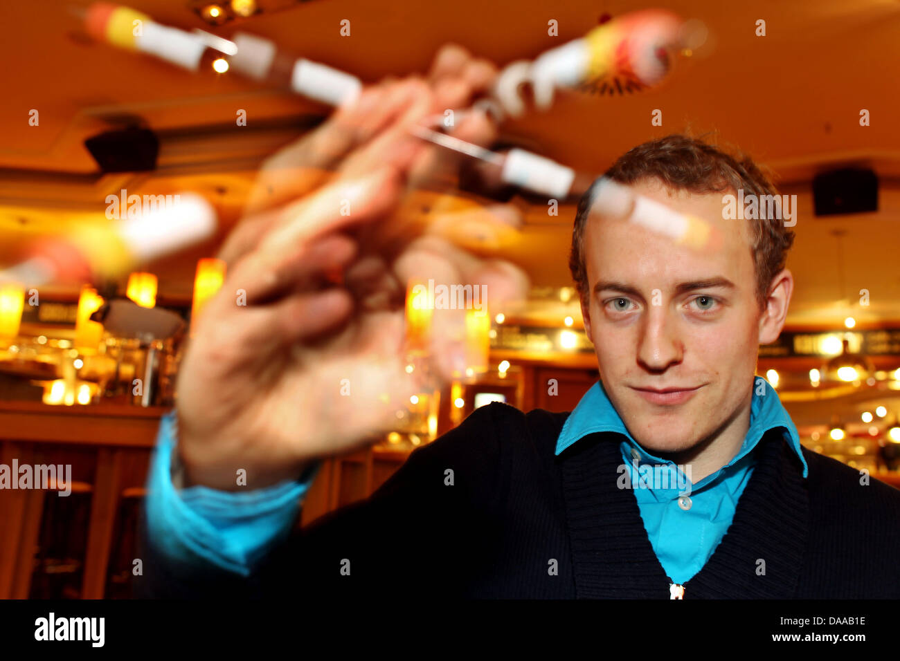 Penspinner Rober Hein presents a trick in Aachen, Germany, 14 January 2011.  The 24-year-old is the most famous German pen-spinning artist. The  acrobatic tricks with pens are not only fun to do,
