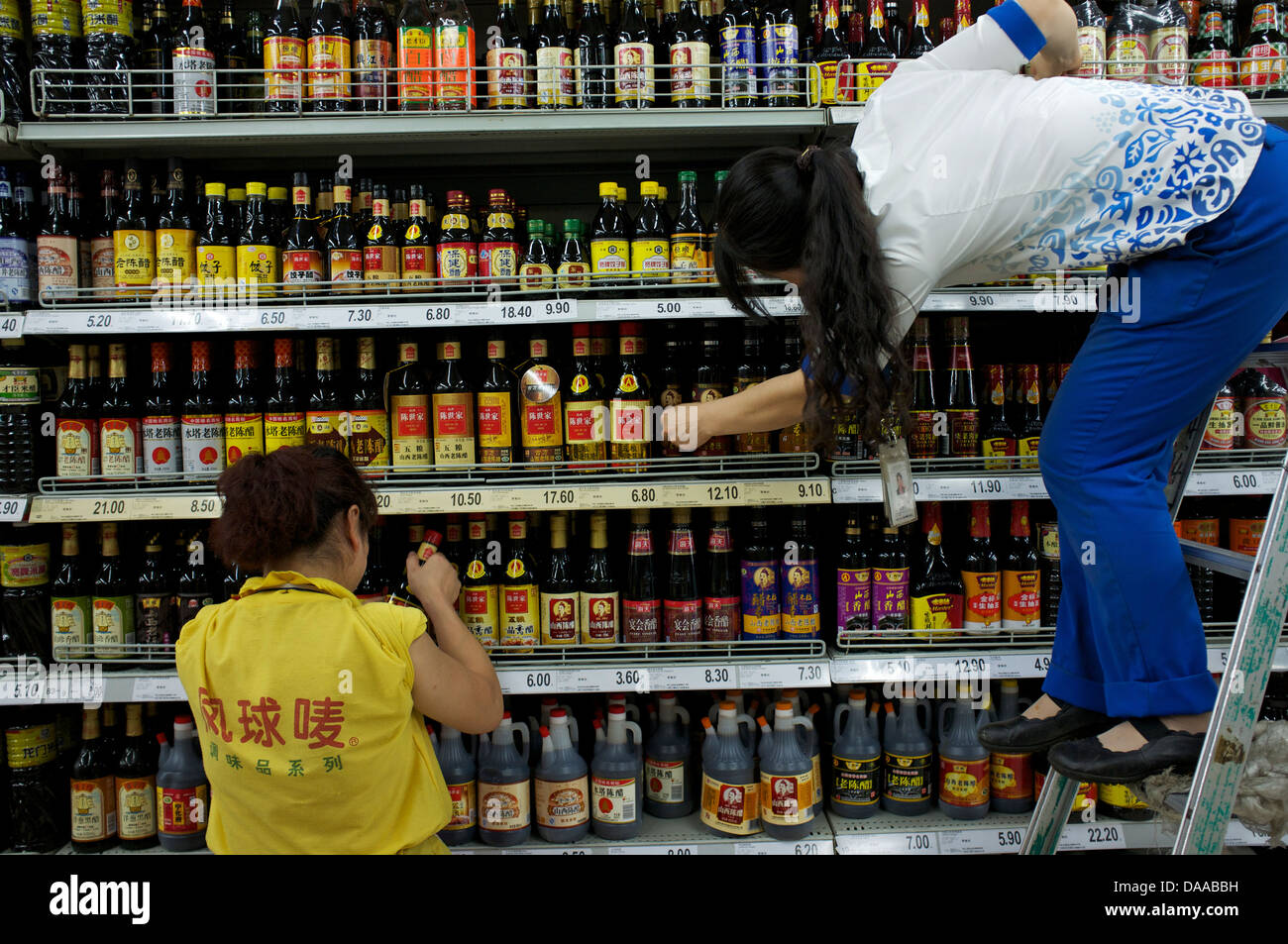 Bottled soy sauce and vinegar are on sale in a supermarket in Beijing, China. 09-Jul-2013 Stock Photo