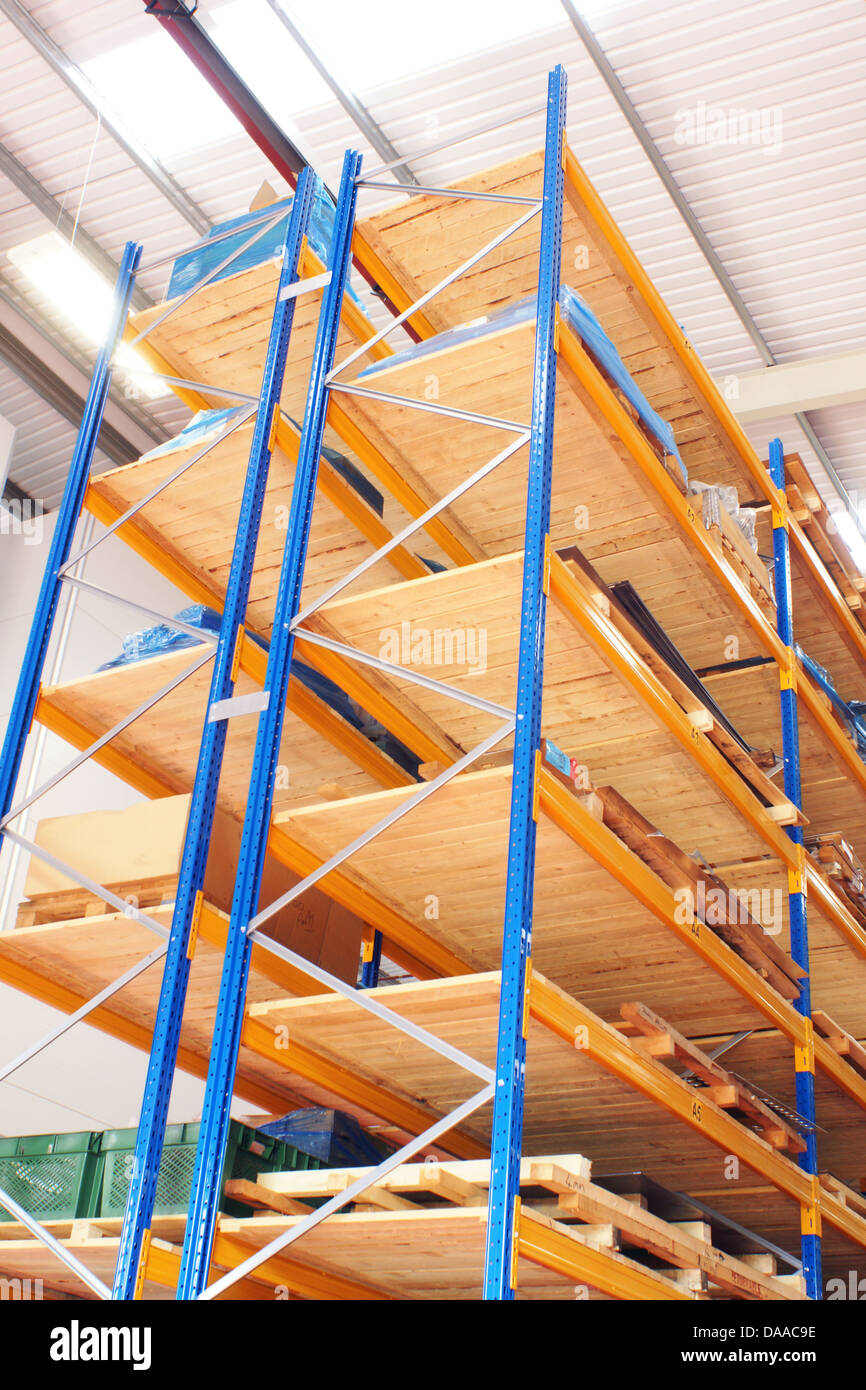 Vertical storage racks in a modern warehouse Stock Photo Alamy