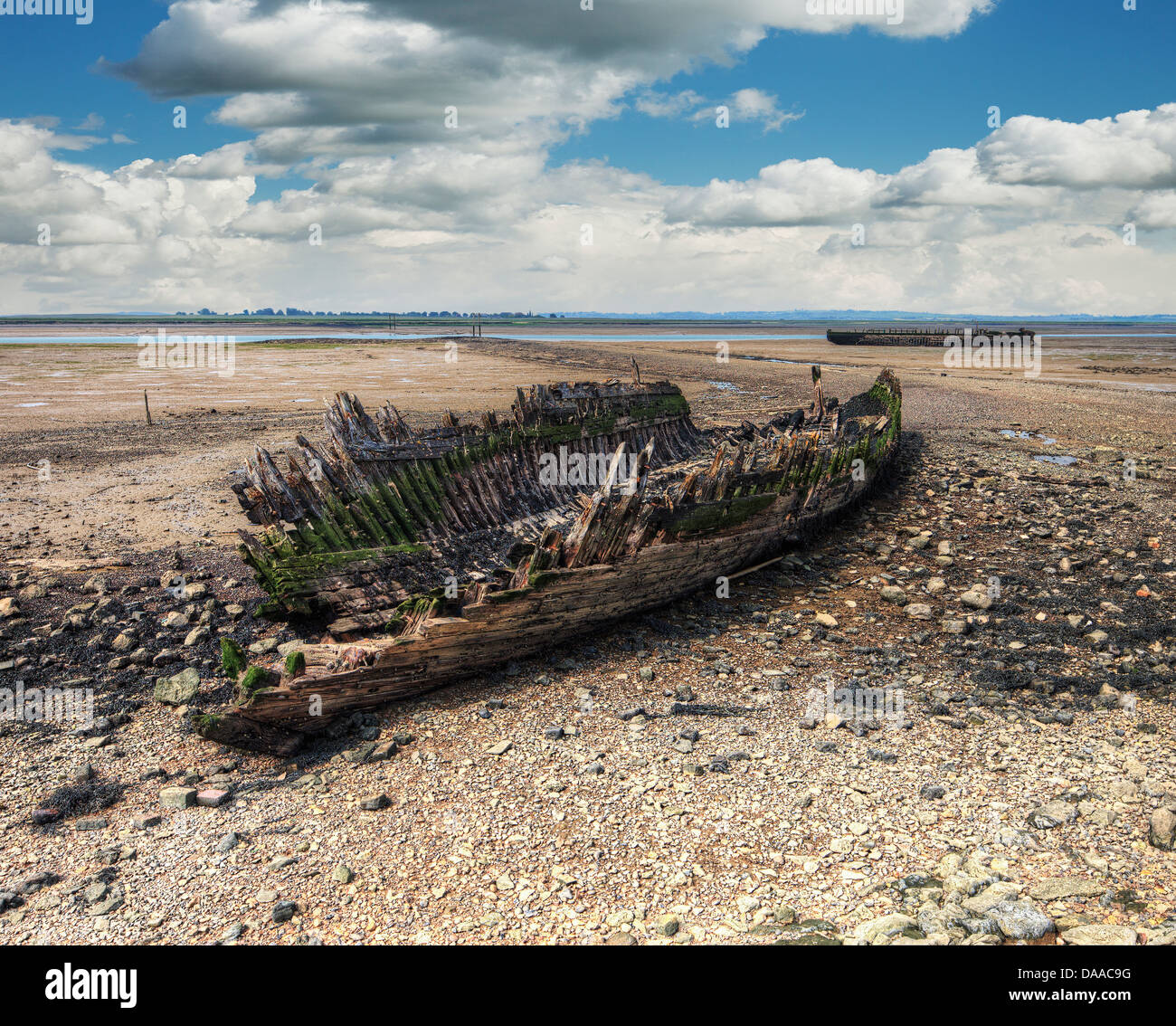 Shipwrecks at Elmley Reach, The Swale. (Possibly WW2 wooden minesweepers.) Stock Photo