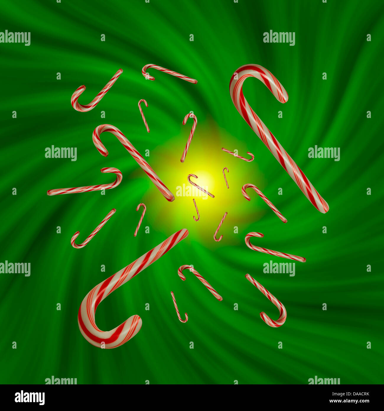 Candy canes floating in a green vortex Stock Photo