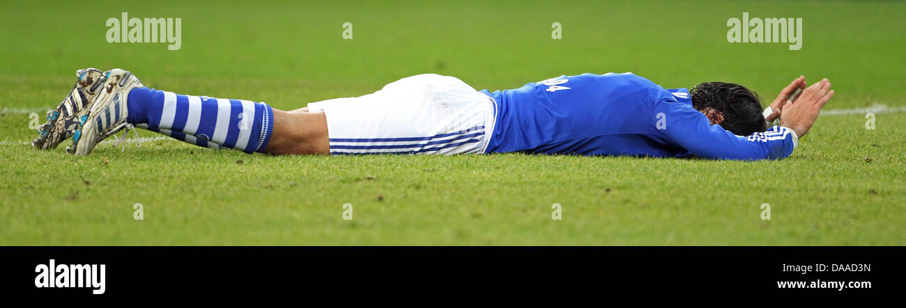 DFB-Cup Soccer Quarter-Finale: FC Schalke 04 versus 1.FC. Nürnberg on 25 January 2011 at the Veltins-Arena in Gelsenkirchen, Germany. Schalke player Raul Gonzales Blanco lying flat on the ground. Schalke won 3:2 after extra time. Photo: Friso Gentsch    (ATTENTION: The DFB prohibits the utilisation and publication of sequential pictures on the  internet and other online media durin Stock Photo
