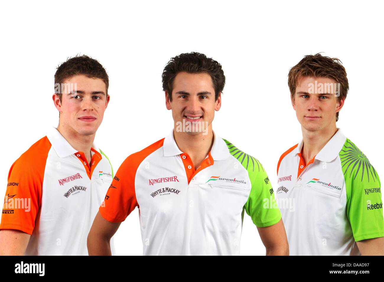 (L to R): Paul di Resta (GBR) Force India F1, Adrian Sutil (GER) Force India F1 and Nico Hulkenberg (GER) Force India F1.  Force India Headquarters, Silverstone, England,  January 2011. Stock Photo
