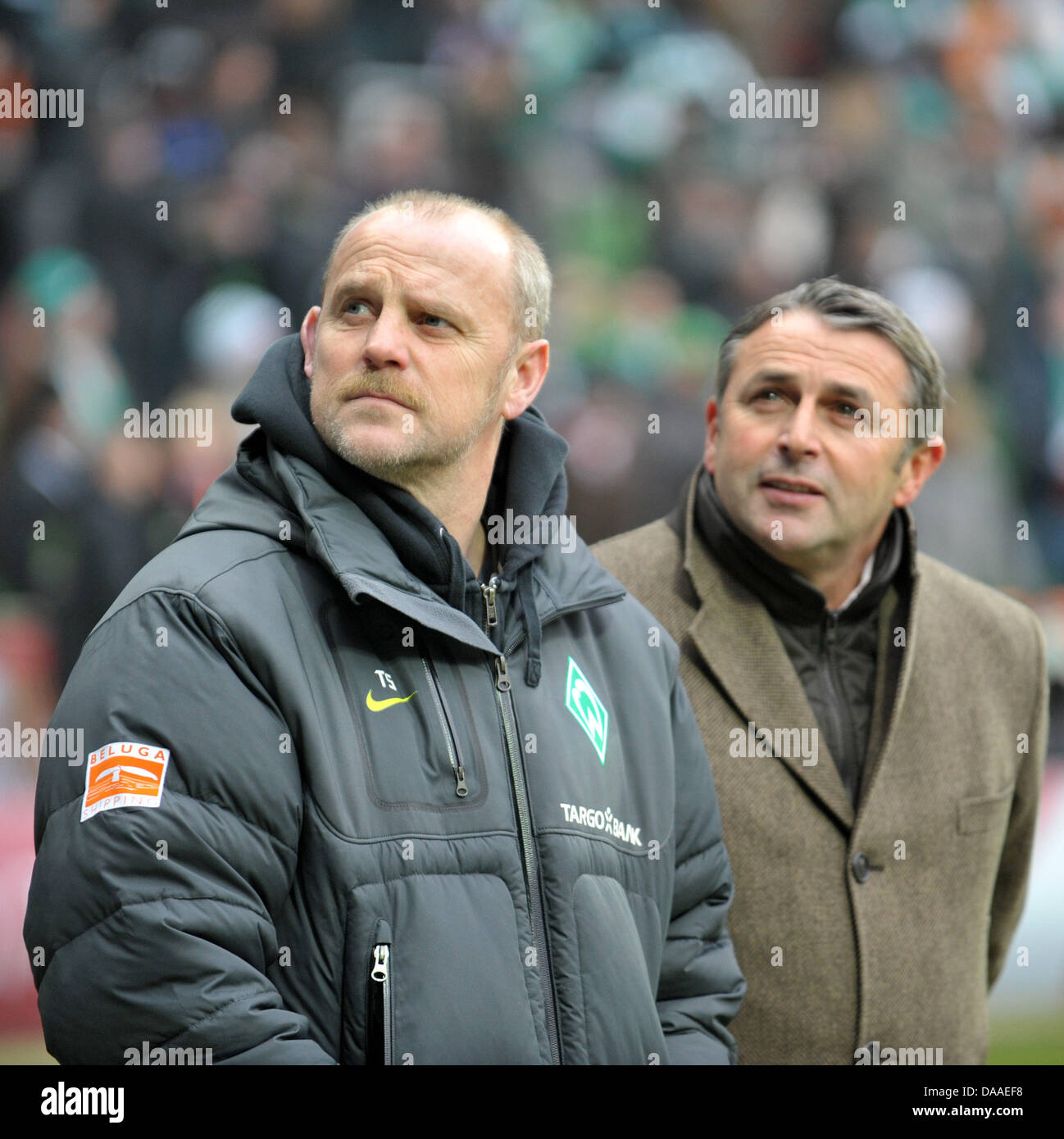 Werder Bremen's head coach Thomas Schaaf (L) and Werder's managing director Klaus Allofs look around the soccer stadium prior to the Bundesliga soccer match between Werder Bremen and Bayern Munich in the Weser Stadion in Bremen, Germany, 29 January 2011. Photo: Carmen Jaspersen   (ATTENTION: EMBARGO CONDITIONS! The DFL permits the further utilisation of the pictures in IPTV, mobile Stock Photo