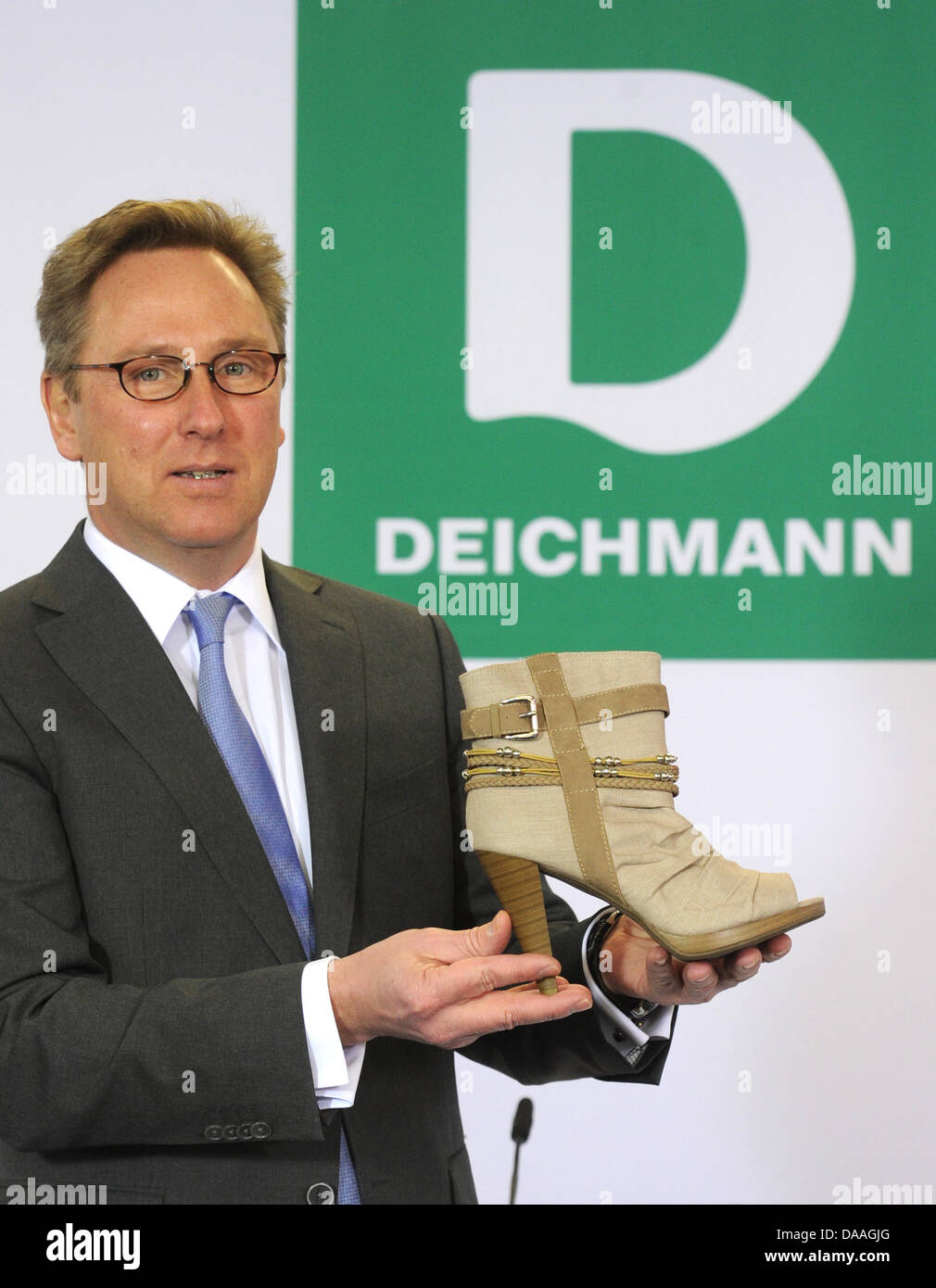 Deichmann head Heinrich Deichmann presents the shoe retailer's new logo in  Essen, Germany, 01 February 2011.