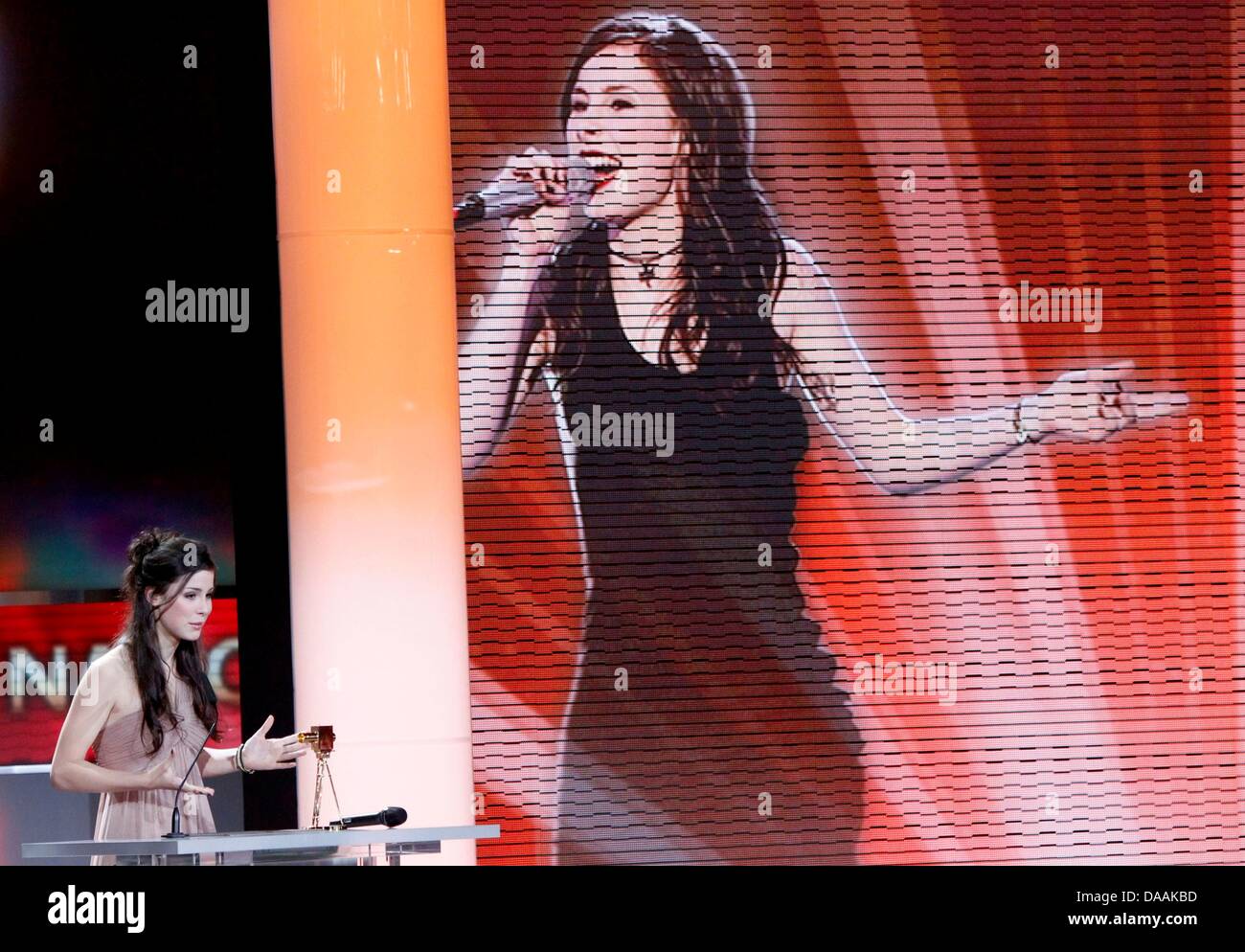 German singer Lena Meyer-Landrut receives her trophy for best national music artist during the 46th Golden Camera award ceremony in Berlin, Germany, 5 February 2011. The award honours the audience's favourites from film, television, sports and media. Photo: Tobias Schwarz dpa/lbn Stock Photo