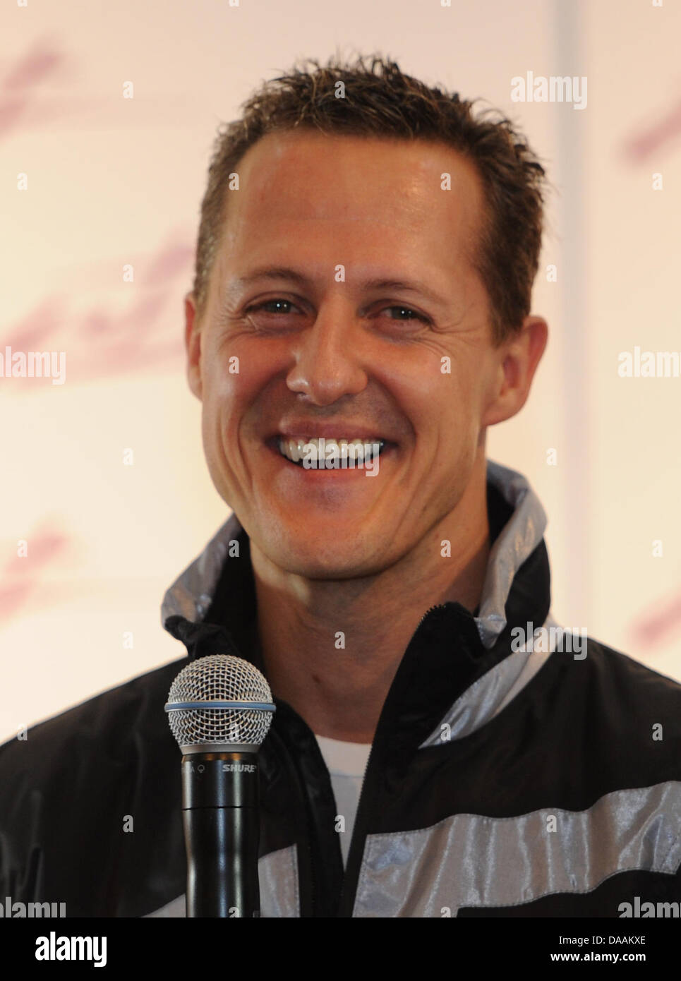 Formula One pilot Michael Schumacher visits the sporting goods trade fair ispo iN Munich, Germany, 06 February 2011. 2267 exhibitors from 49 countries participate in the trade show that runs until 09 February. Photo: Marc Mueller Stock Photo