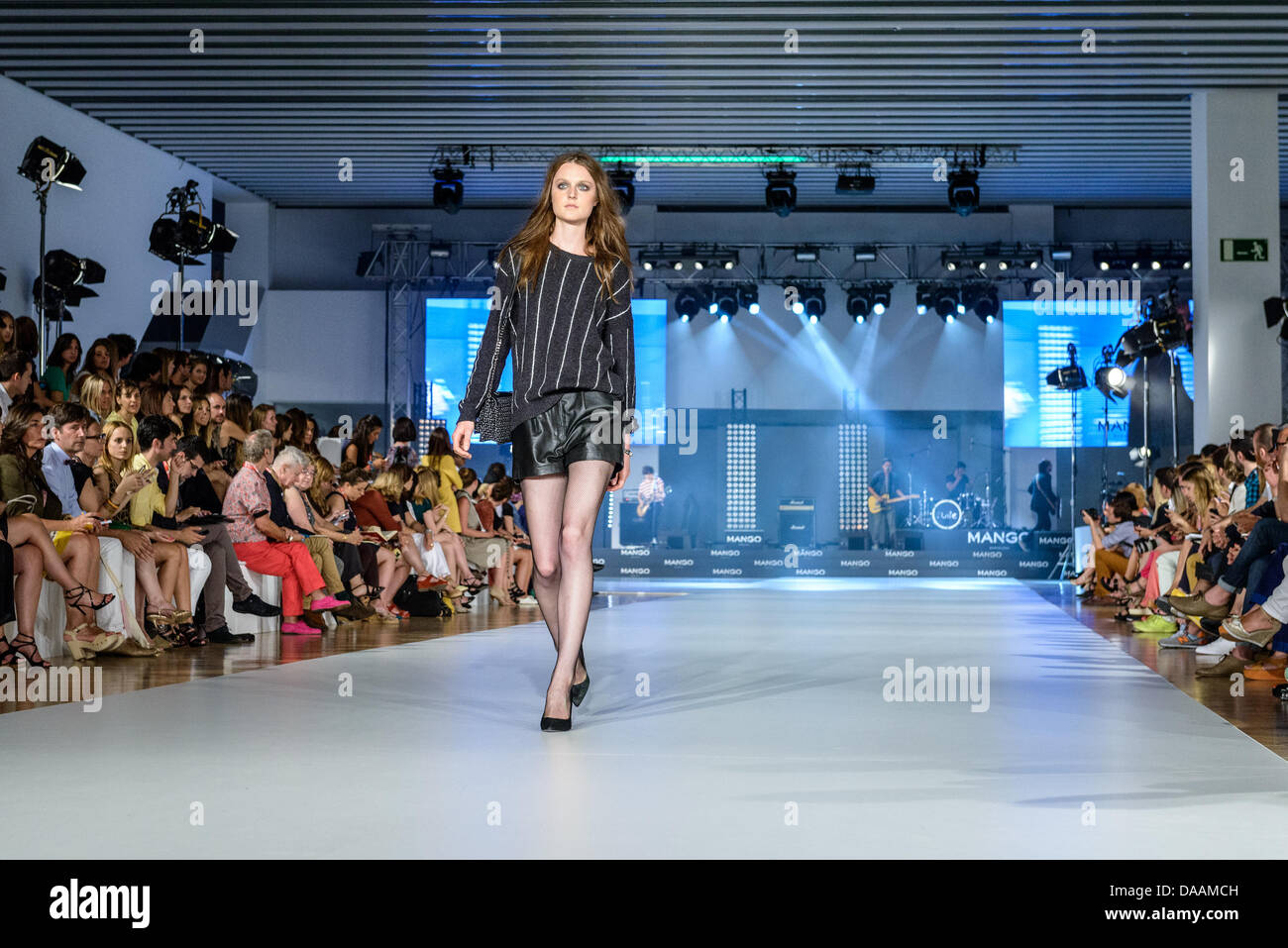 Barcelona, Spain. 7th July, 2013. Model on catwalk presents the Mango Spring/Summer 2014 collection at the 080 Barcelona Fashion. Credit:  Matthias Oesterle/Alamy Live News Stock Photo