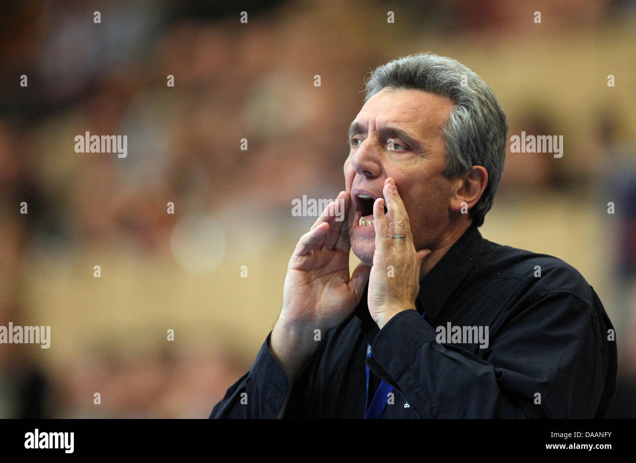 Claude Onesta, coach of France, reacts during the Men's Handball World Championship preliminary round group A match Germany against France in Kristianstad, Sweden, 19 January 2011. Photo: Jens Wolf dpa Stock Photo
