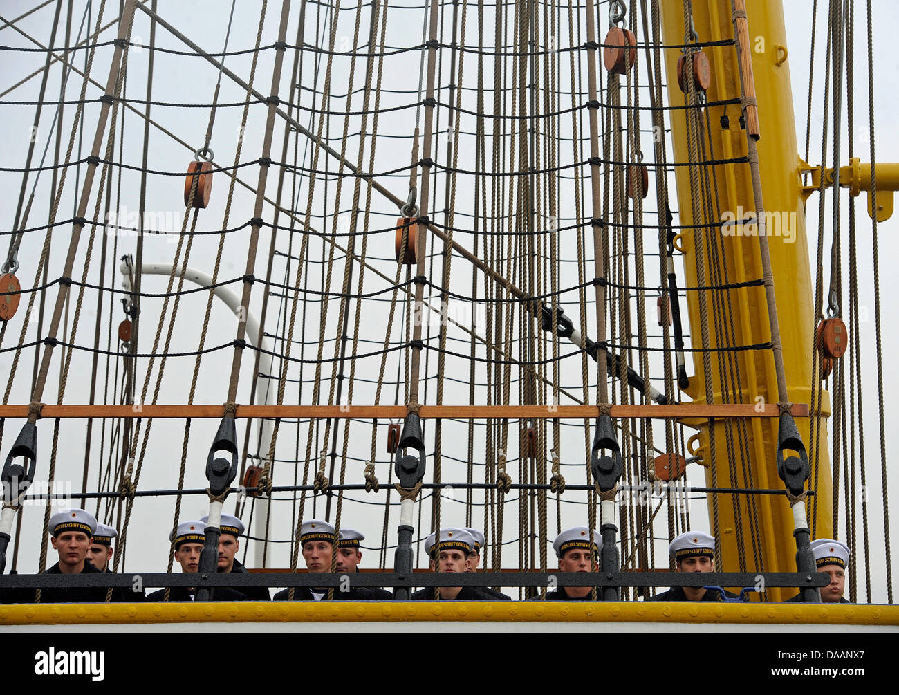 (file) - A dpa file picture dates 05 August 2010 shows sailors in the rigging of the German naval training ship 'Gorch Fock' in Hamburg, Germany. After a female officer cadet fell to her death from the rigging of the ship's three masts in November 2010, the German Navy now investigates on suspicion of mutiny. According to a spokesperson of the German Bundestag, official investigati Stock Photo