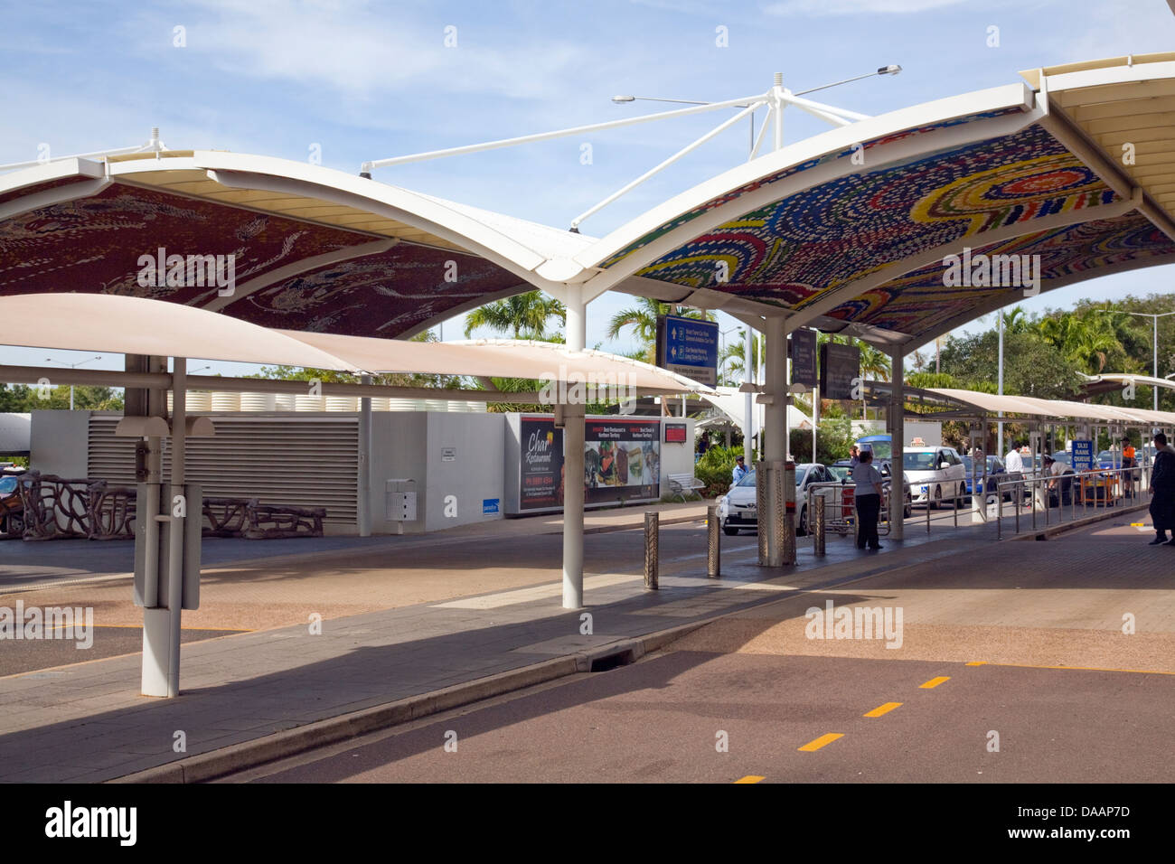 Darwin airport in the northern territory of Australia with aboriginal indigenous artwork paintings on the ceiling of a covered parking area Stock Photo