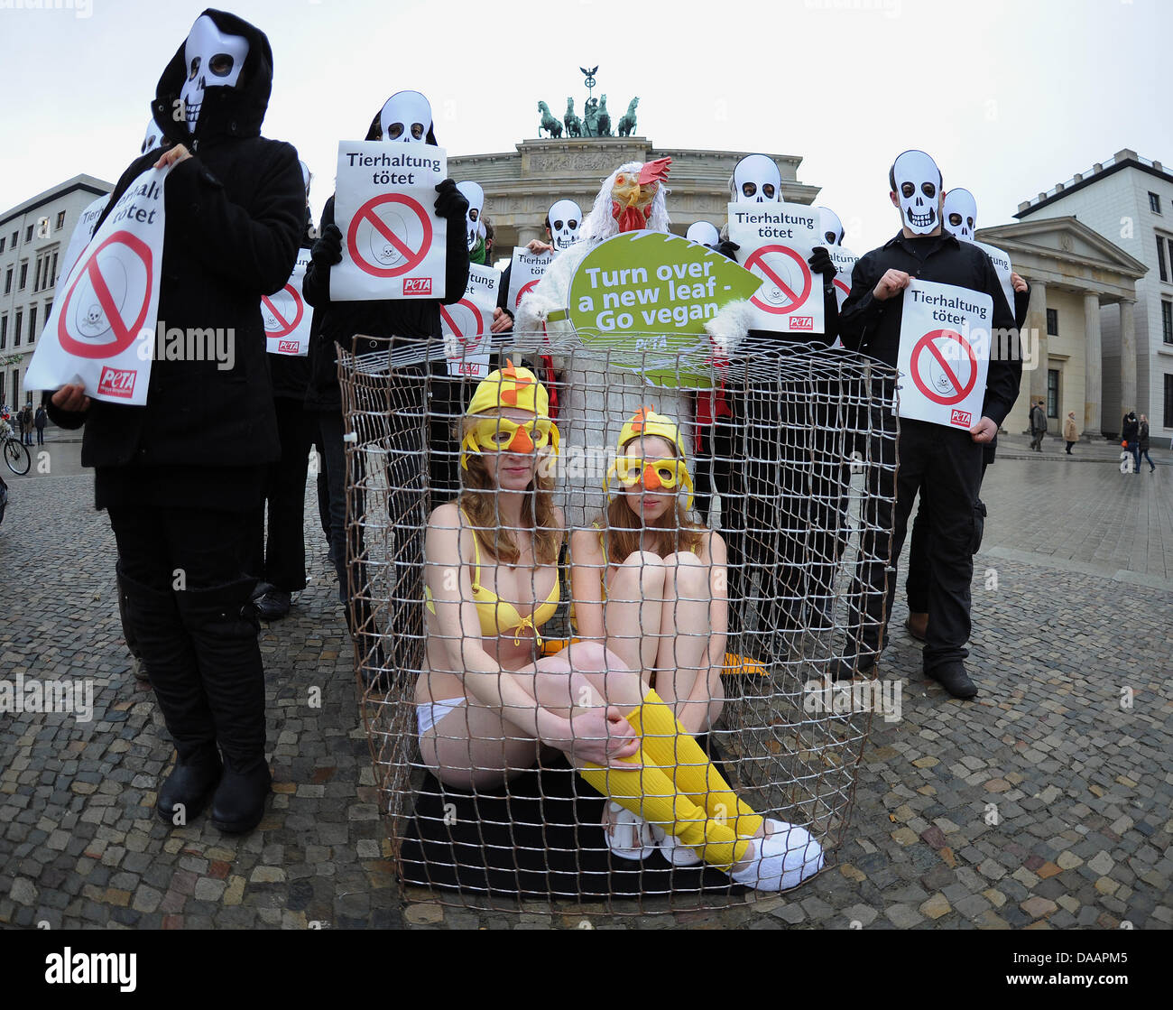 PETA activists protest against factory farming in Berlin, Germany, 21 January 2011. Photo: HANNIBAL Stock Photo