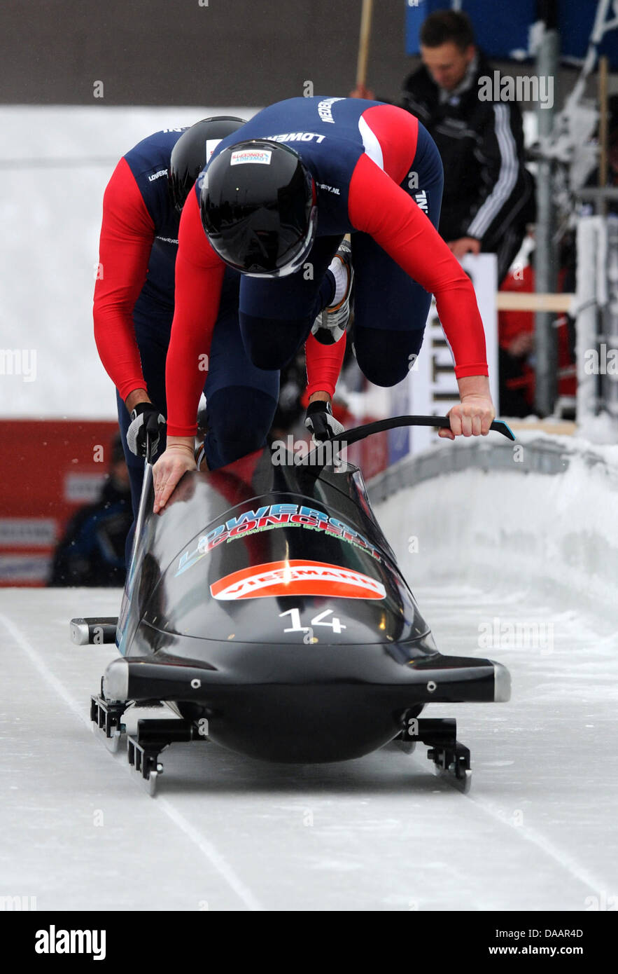 Two-men bobsleigh runners Edwin van Calker (R) and Sybren Jansma from ...