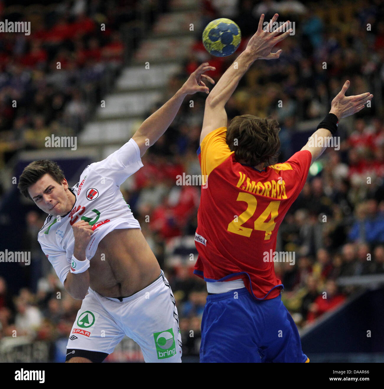Eivind Tangen of Norway (R) against Viran Morros of Spain during the Men's  Handball World Championship