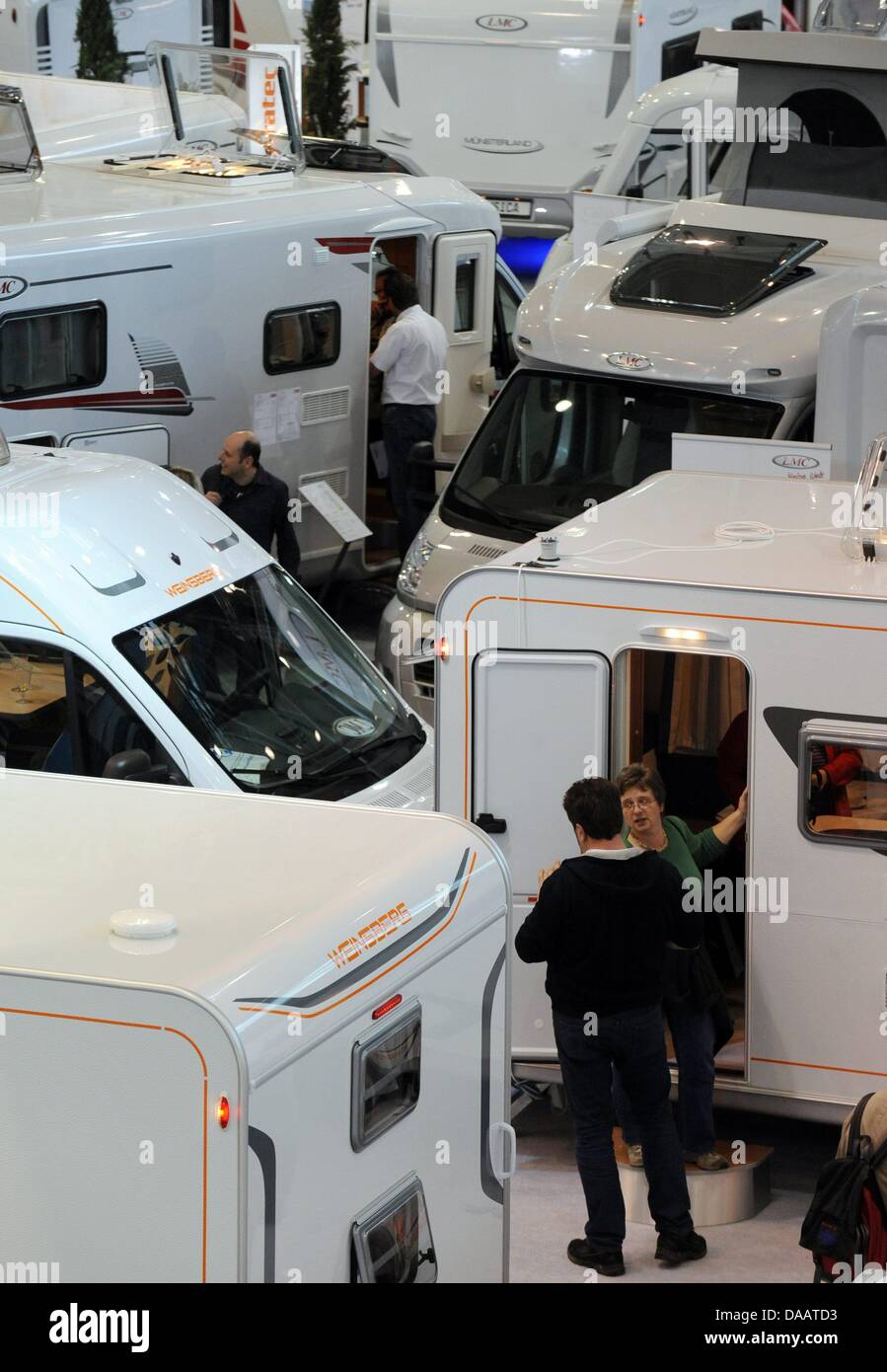 Caravans by Weinsberg stand in a hall during the CMT trade show for