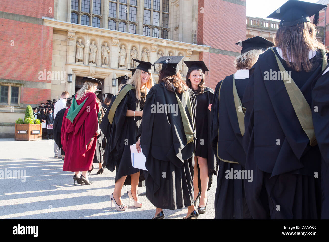 Graduates standing together after a graduation ceremony at Birmingham University, UK. Stock Photo