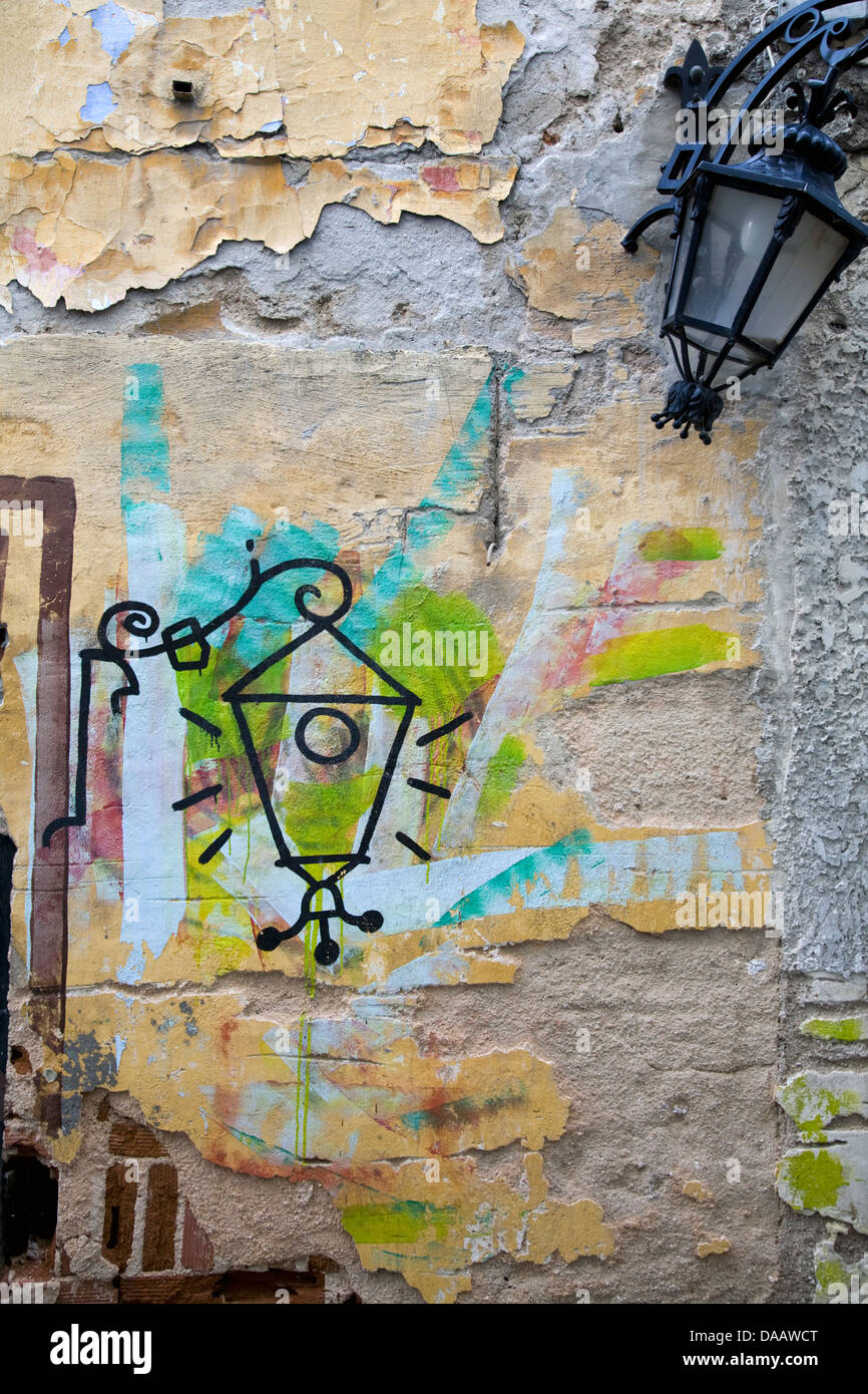 Artful graffiti in the charming and popular Plaka section of central Athens, Greece. Stock Photo