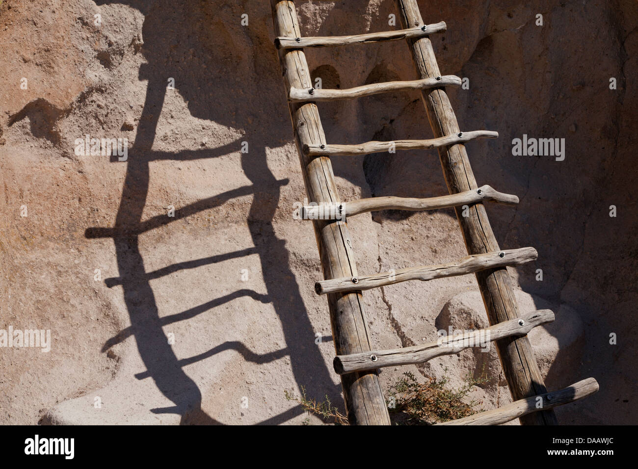 A ladder leading to a prehistoric cliff dwelling in Frijoles Canyon in Bandelier National Monument, New Mexico. Stock Photo