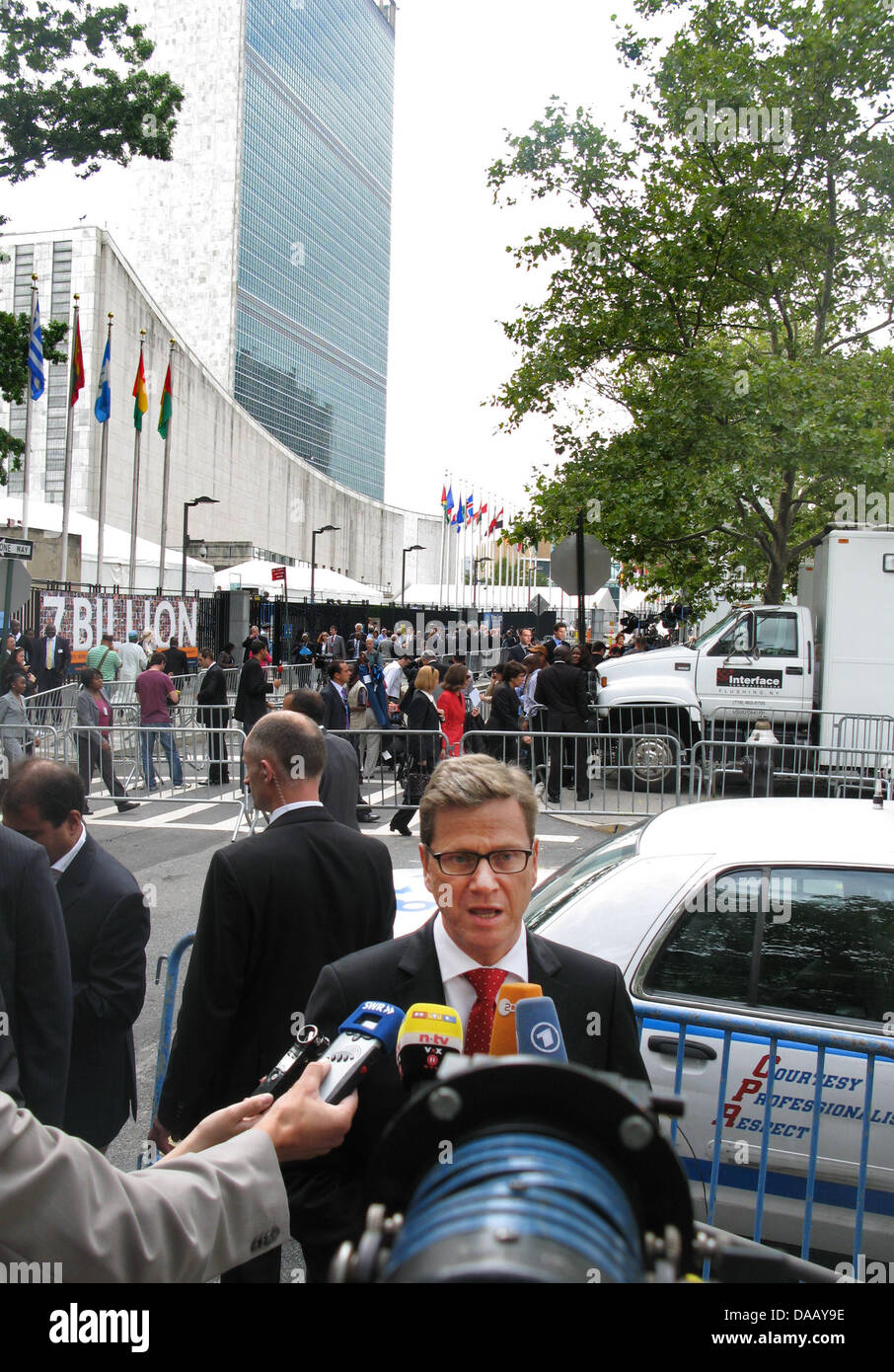 German Federal Foreign Minister Guido Westerwelle (FDP) answers journalists' questions in front of the United Nations in New York, USA, 21 September 2011. Westerwelle took part in the general assembly of the United Nations. Photo: Christoph Sator Stock Photo
