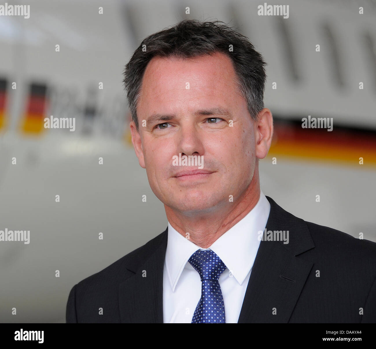 Eckhard Breuer, sales director for Bombardier, stands in a hangar in